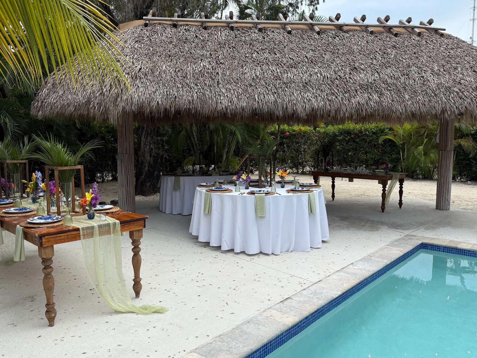 Poolside reception under the tiki pavilion